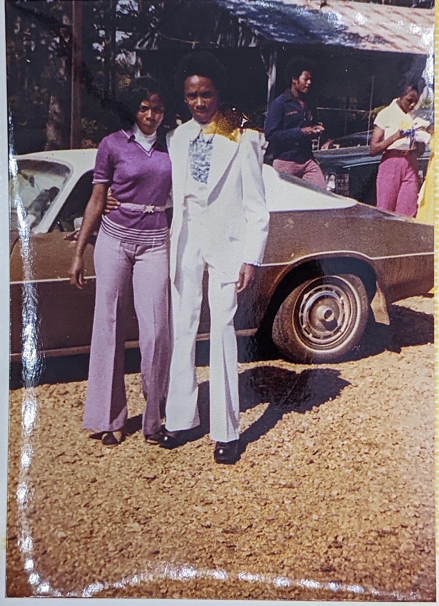 click to see item Couple in front of Car