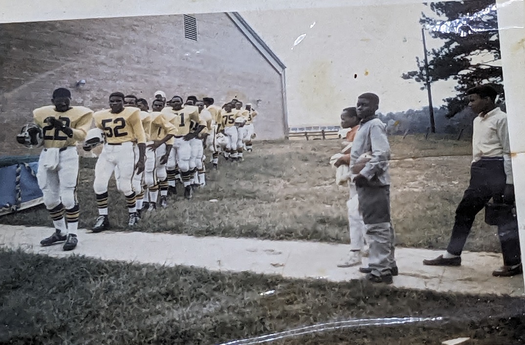 click to see item Lineup of Football Players in Yello Uniform